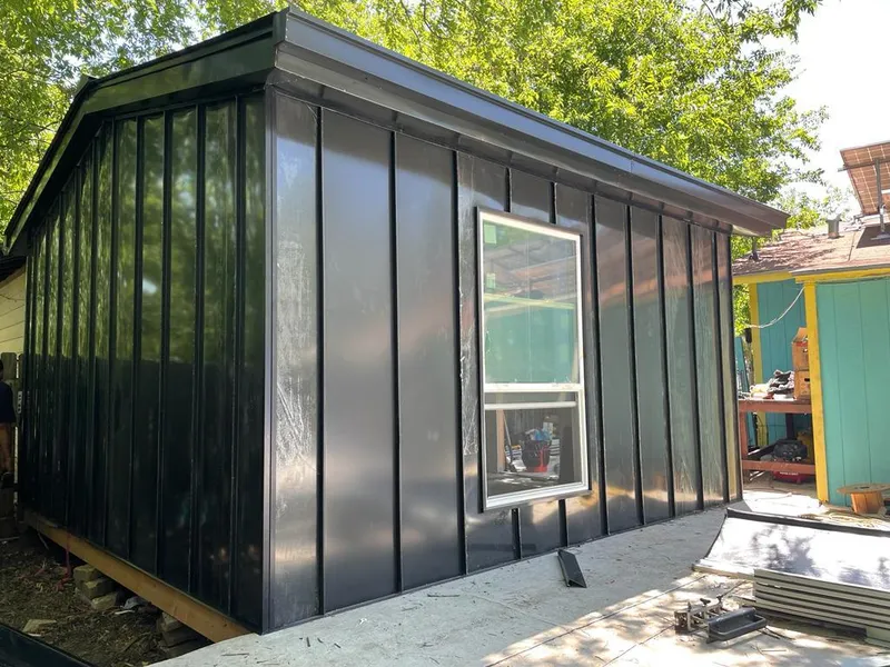 Black standing seam metal wall panels for Roof Inspection in Clearwater