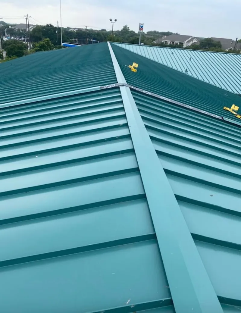 Green commercial metal roof ridge and valley for Metal Roof Repair in Clearwater